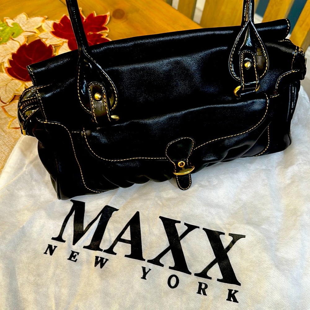 Black Maxx New York bag gold stitch- gold tone hardware. Paisley lined + key fob